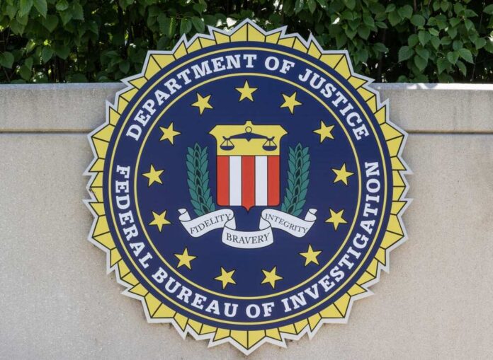 FBI seal featuring stars and laurel leaves