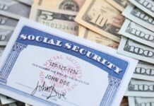 Social Security Alert: Cuts Coming Sooner, Will Hit Hard A social security card placed on top of various denominations of U.S. currency
