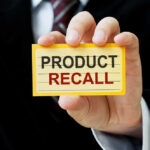 RECALL ALERT: Choking Nightmare Hand holding a product recall card