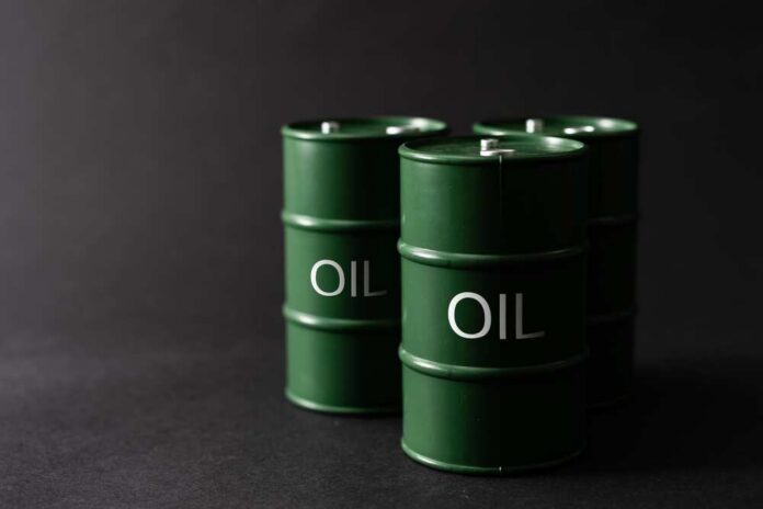 Green,Oil,Tin,Barrels,On,Black,Background