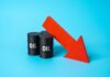 Three black oil barrels with the word 'OIL' and a red downward arrow