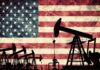 Outrage Erupts: Trump vs. Big Oil Silhouettes of oil pumps in front of a distressed American flag
