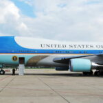 Air Force One Decoy? Trump Vanishes Mid-Trip Airplane on runway with visible landing gear engines