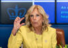 Jill Biden yellow speaking and gesturing with hand
