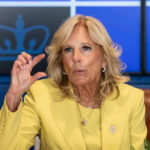 Tragic Plea: Jill Biden Calls Out To Beau Jill Biden yellow speaking and gesturing with hand