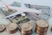Airline Charges For Overhead — Outrage Erupts An airplane taking off near an airport control tower