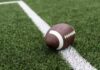 VIDEO: Tragedy After Touchdown As Player Dies Football player kneeling on the field with a helmet beside them