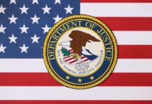 Department of Justice seal on American flag background