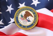 Judge Slaps DOJ: Explain Bannon Wipeout Department of Justice seal on an American flag background