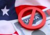 Visa Purge Targets Asylum Tactic U.S. Citizenship and Immigration Services building sign.