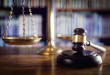 Scales and gavel on a judges desk.