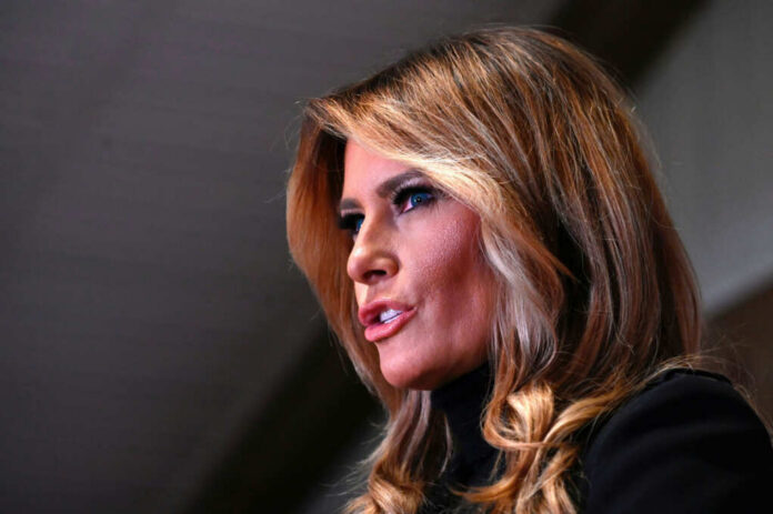 Melania Trump in a close-up side profile speaking