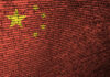 China flag overlaid with computer code