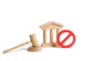 Judge Orders Trump – 30-Day Warning Wooden gavel, courthouse model, and red prohibition sign on white background