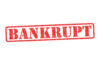 Pancake House BANKRUPTCY – Griddle Stays Hot? Red stamped word bankrupt on white background