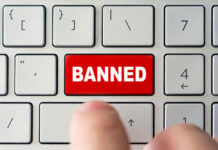 California’s Shocking Ban Sparks Showdown Red banned key on computer keyboard pressed