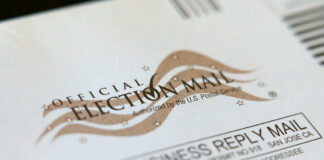 Official election mail envelope with postal service markings
