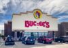 Exterior view of a Buc-ee's convenience store with cars parked outside