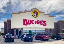 Exterior view of a Buc-ee's convenience store with cars parked outside