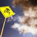 Deadly Incident Shuts the Colosseum Yellow skull and crossbones warning sign against smoky sky