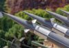 Pentagon Alarm: Missiles Running Thin Close-up of multiple gray missiles with pointed noses and fins