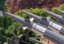 Pentagon Alarm: Missiles Running Thin Close-up of multiple gray missiles with pointed noses and fins