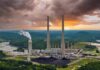 EPA Nukes Carbon Rules Overnight Coal-fired power plant with tall smokestacks at sunset