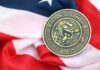 Navy Denial Shattered on Capitol Hill Navy medal resting on an American flag