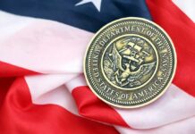 Navy Denial Shattered on Capitol Hill Navy medal resting on an American flag