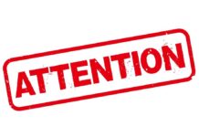 Red stamp with the word 'ATTENTION' in bold letters