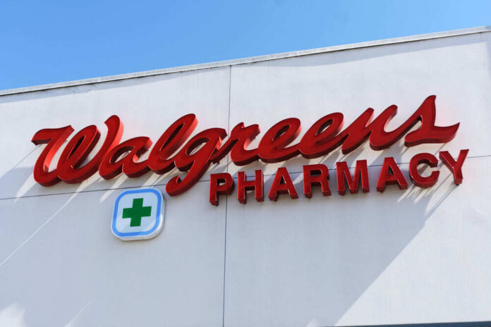 shutterstock_1994826506 Signs for Walgreens and Pharmacy on building facade