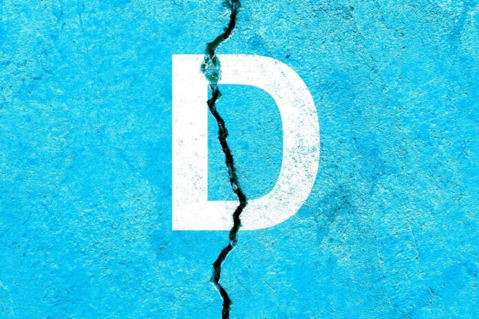 White letter D on cracked blue surface.