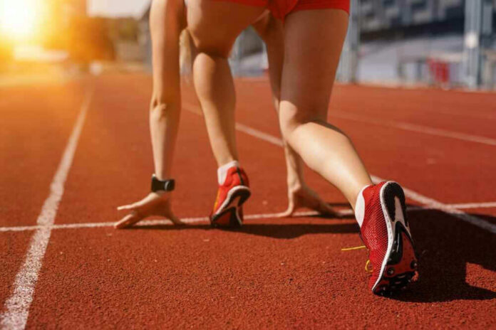 Athlete on starting line of a track.