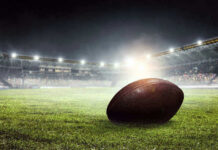 SHOCK: NFL Player Found Dead Football on field in illuminated stadium at night.